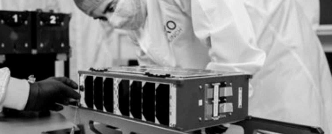 Engineers integrating ATHENA NANO into the Platform-6 satellite in a clean room